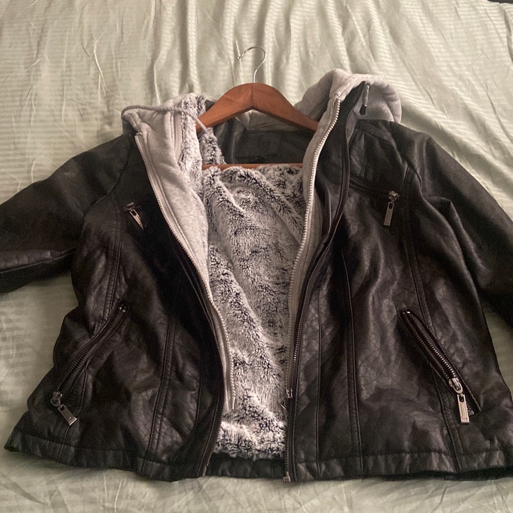 Vegan leather motorcycle jacket with soft liner and sweatshirt hood.